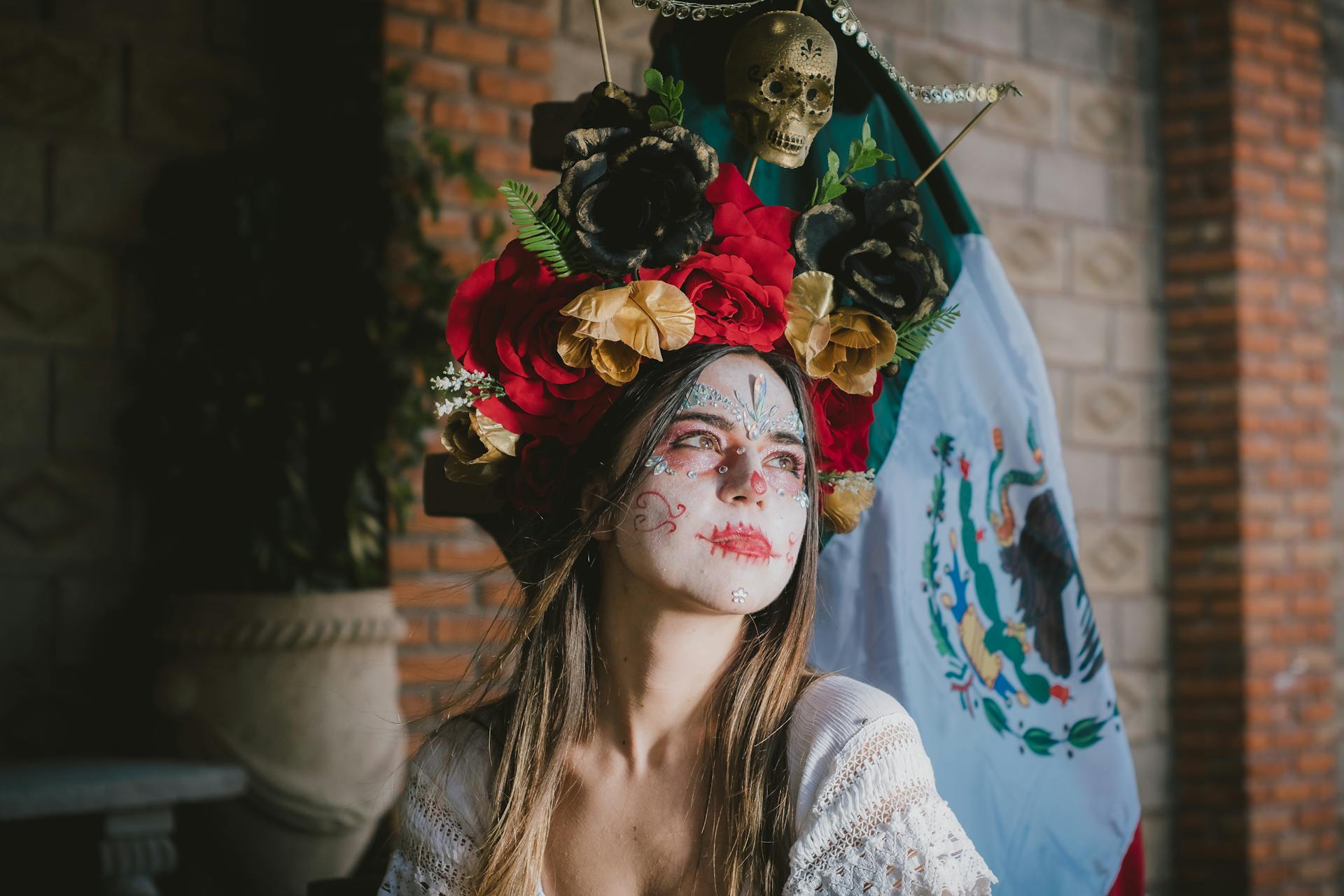 Woman with Painted Face and Wreath with Skull