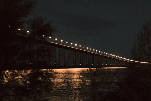 Illuminated Concrete Bridge at Night