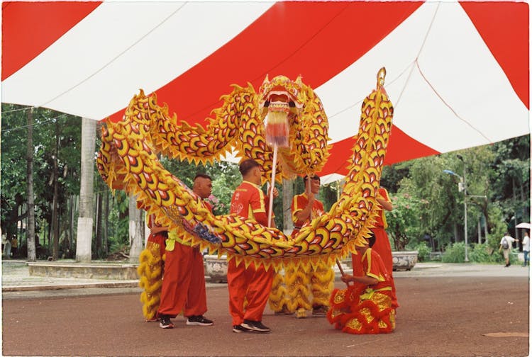 Traditional Chinese Dancers With Dragon