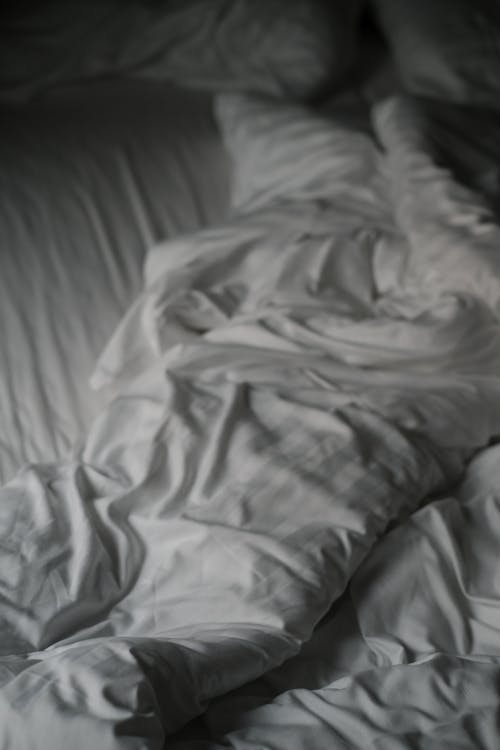 A White Blanket on Bed