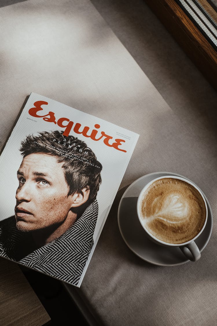 A Cup Of Coffee And A Magazine 