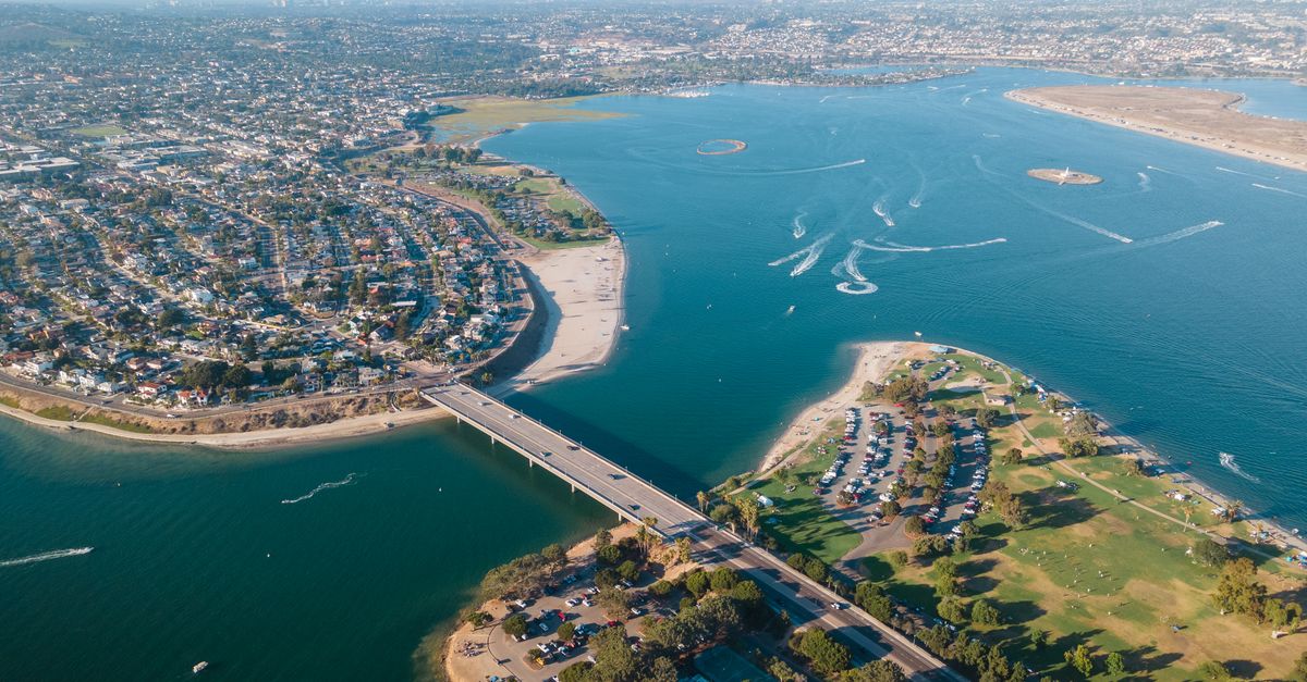 A stunning aerial photograph showcasing the scenic beauty of Mission Bay and its coastline in San Diego, California.