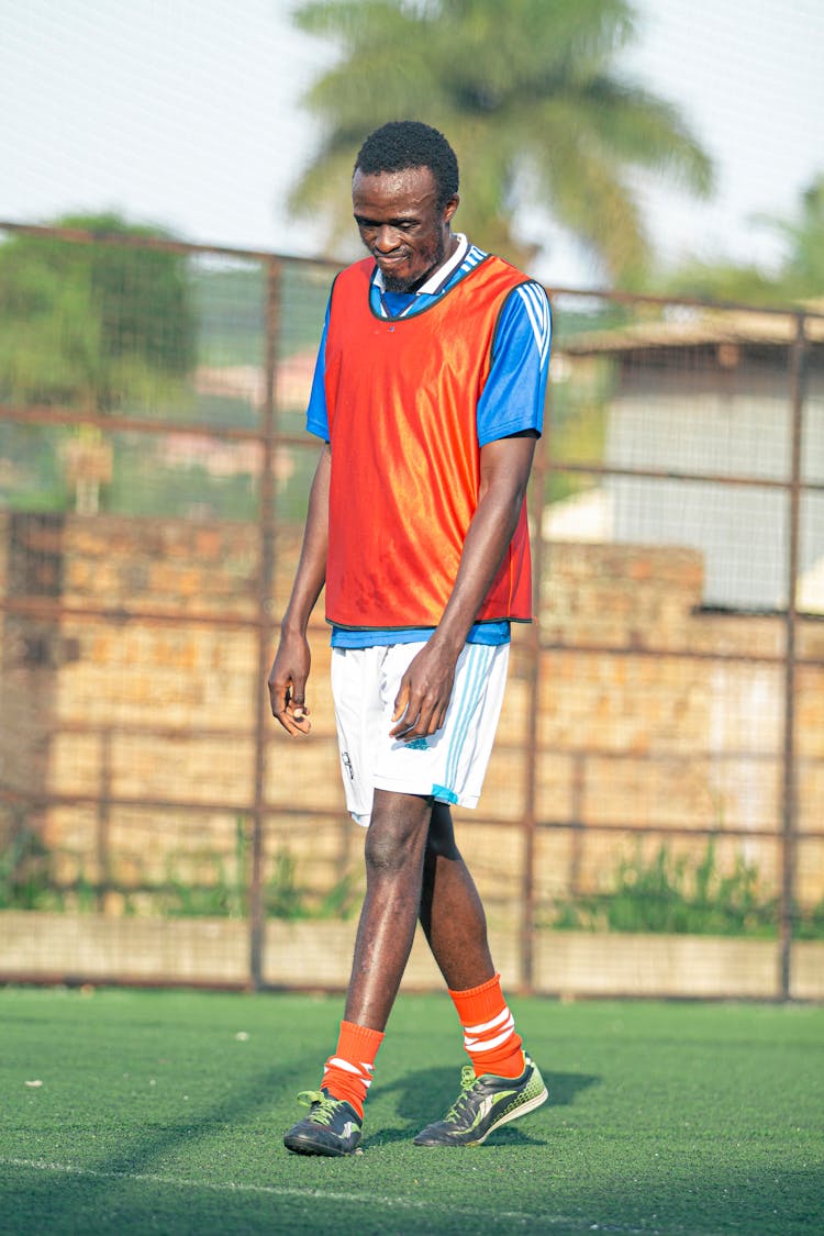 Man In Uniform On Football Field