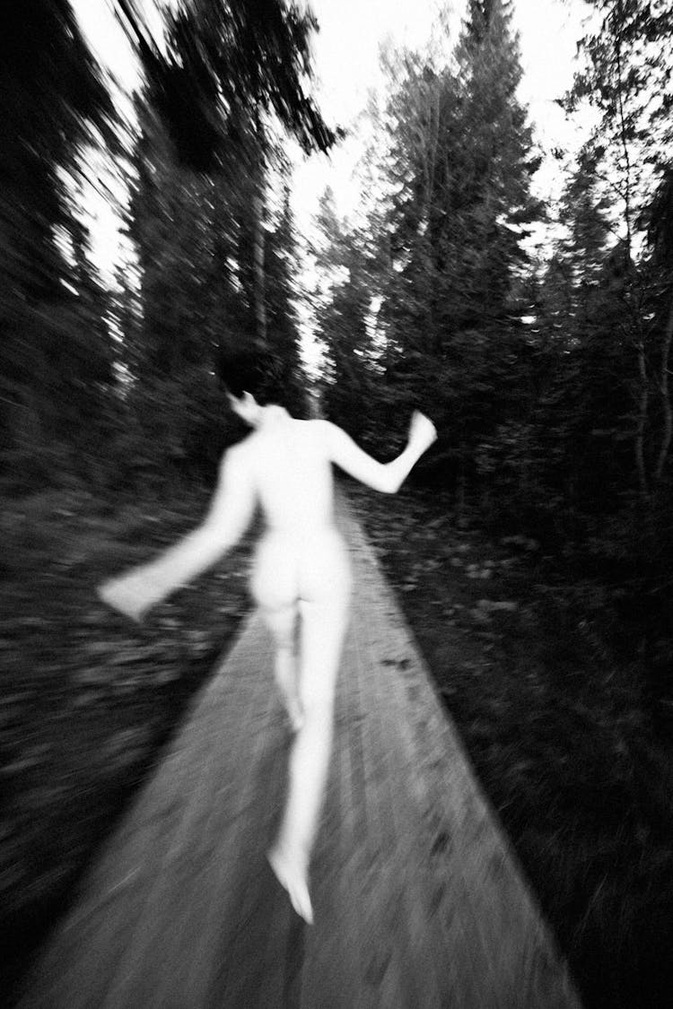 Naked Person Running In The Forest