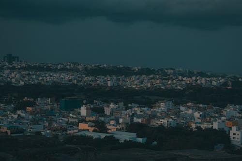 Foto profissional grátis de alvorecer, cair da noite, cidade