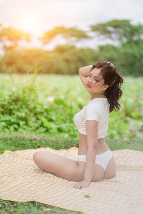 Foto de Sexy female model in white underwear do Stock