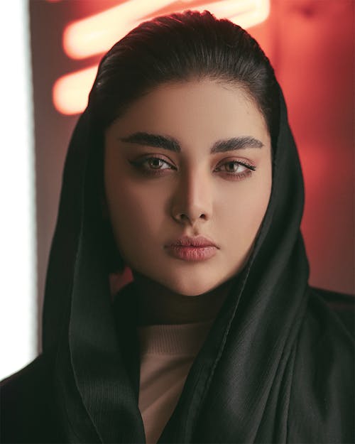 Close-Up Shot of a Beautiful Woman Wearing Black Hijab