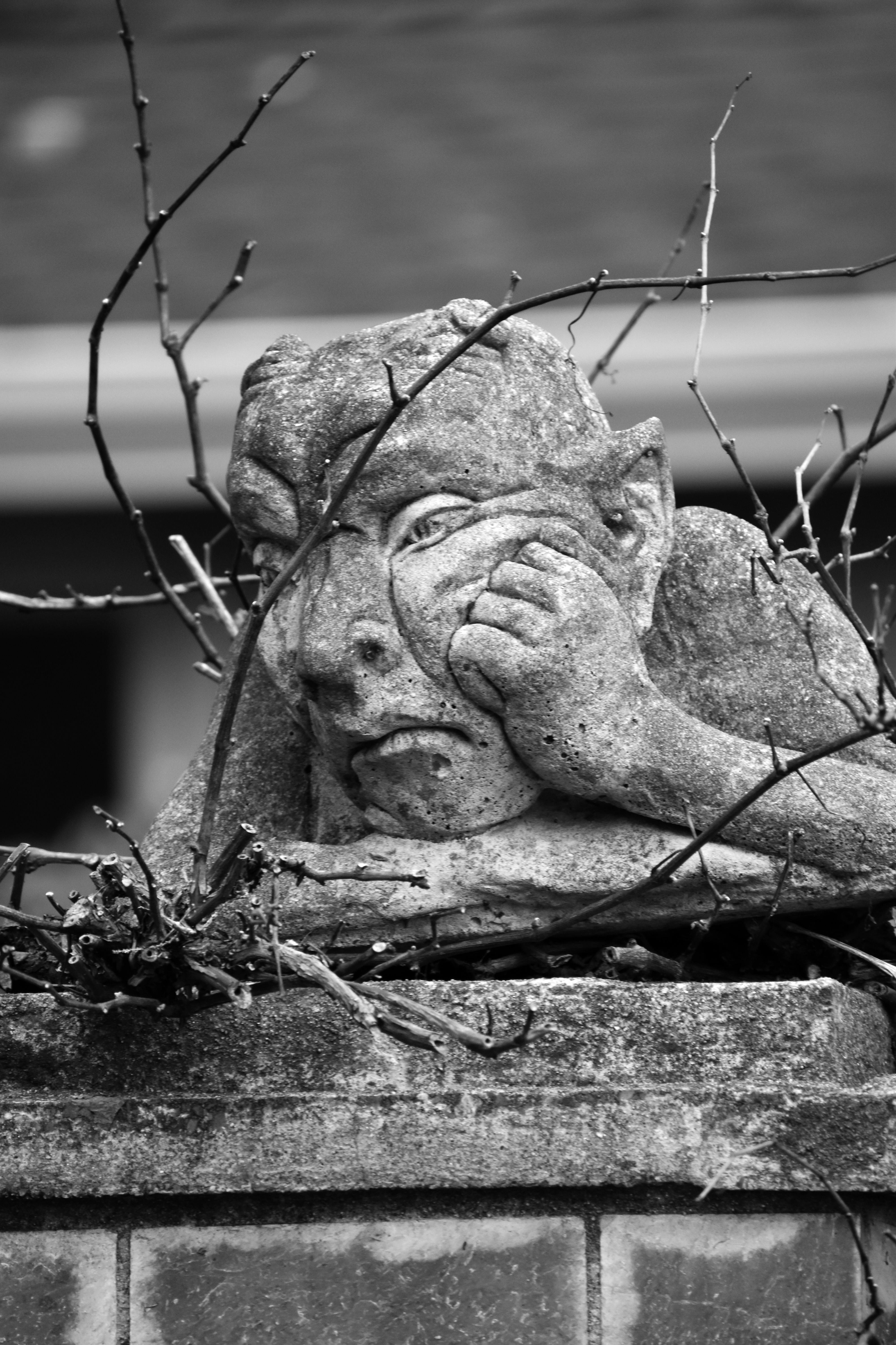 Grayscale Photo of a Concrete Statue · Free Stock Photo