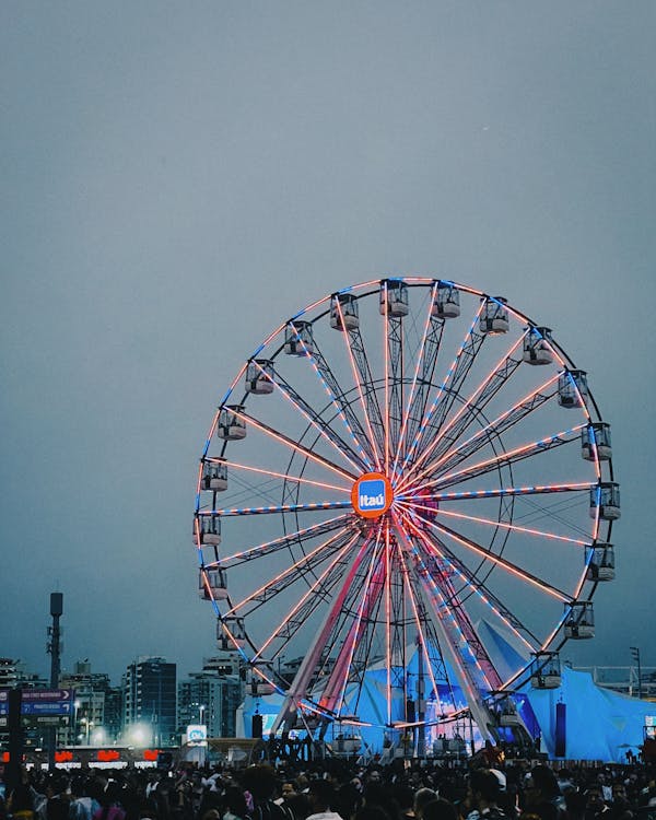 Ferris Wheel With Lights Turned on during Night Time