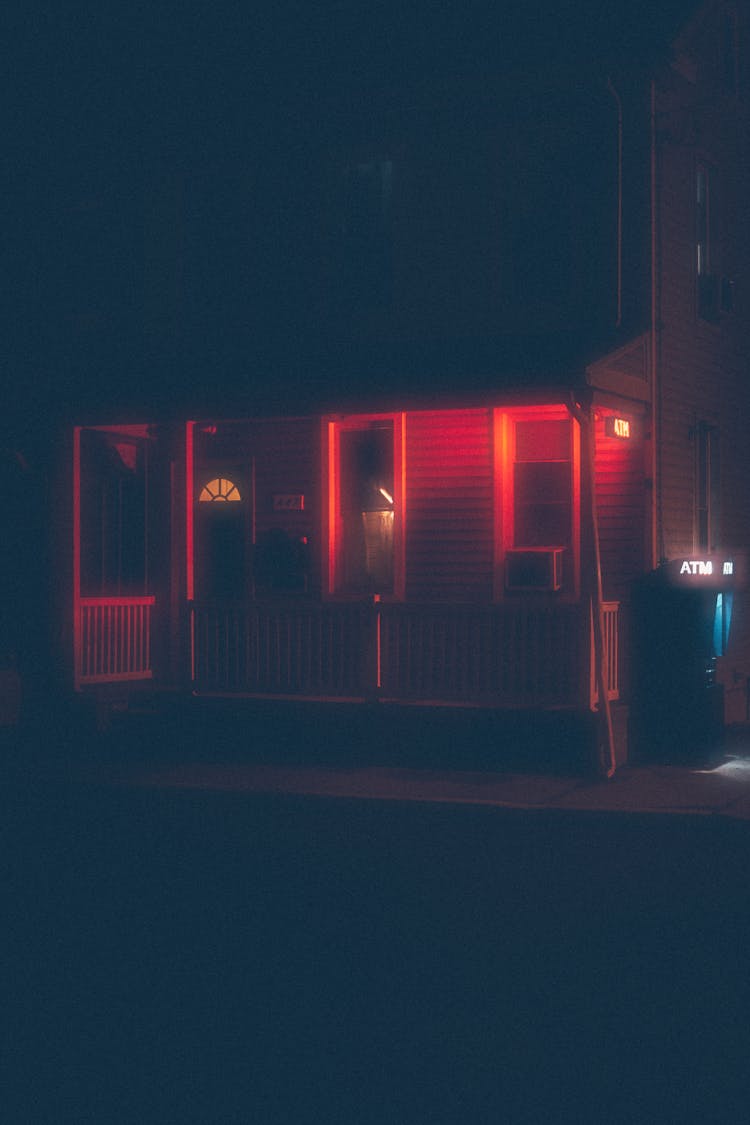 Red Light On Building Wall At Night