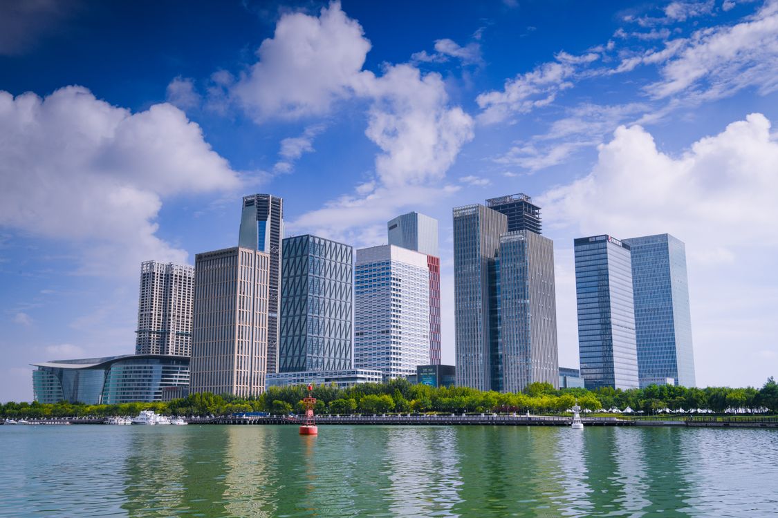 High-Rise Buildings Near Body of Water · Free Stock Photo