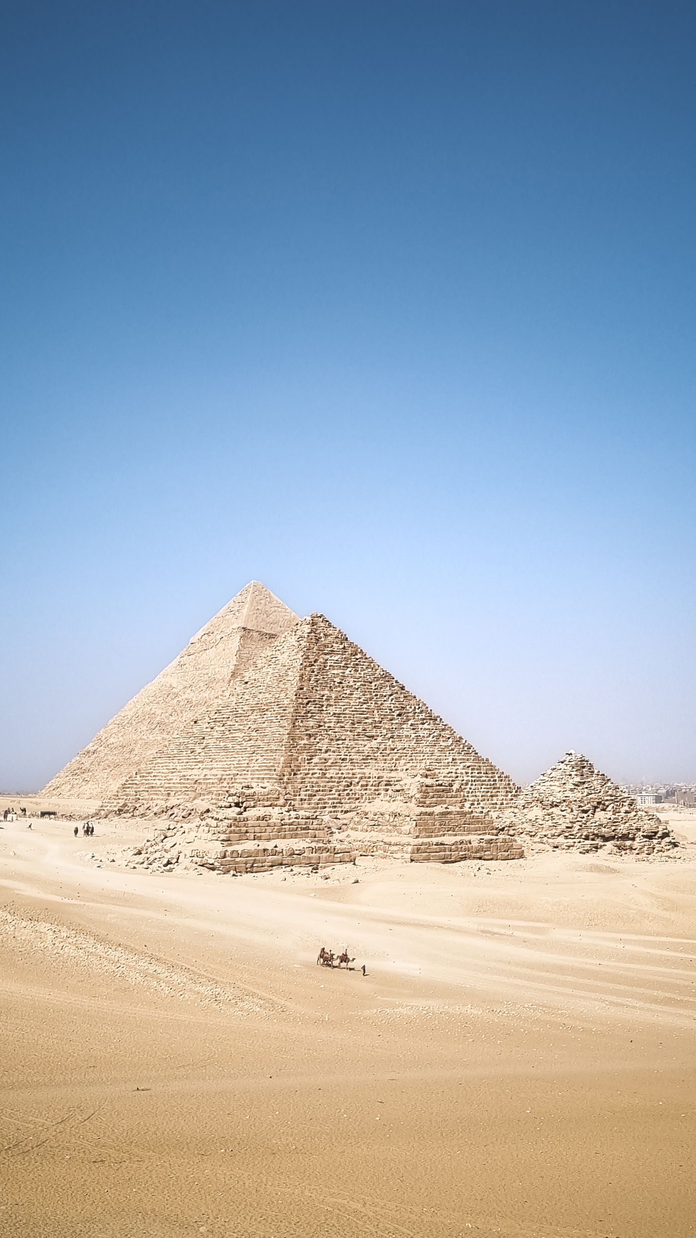 The Great Pyramid of Giza under a clear blue sky