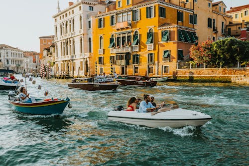 Tourists on Boats in Venice