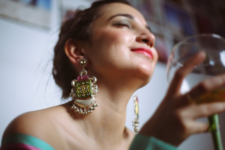 Woman Holding A Glass 