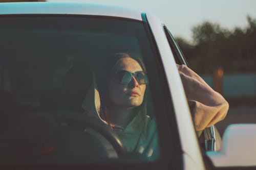 Free Man in Black Sunglasses Driving Car Stock Photo