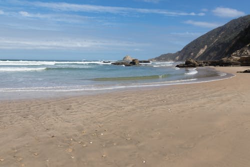 Fotos de stock gratuitas de agua, arena, arena de playa