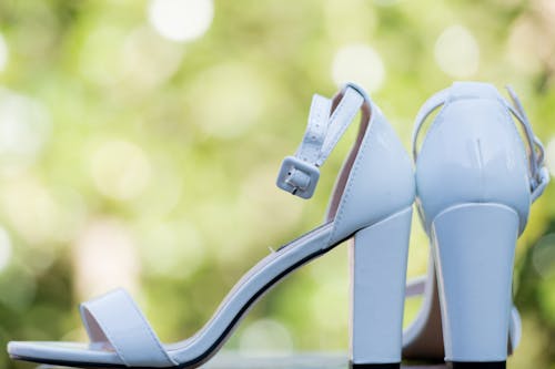 A Close-Up Shot of White High Heeled Shoes