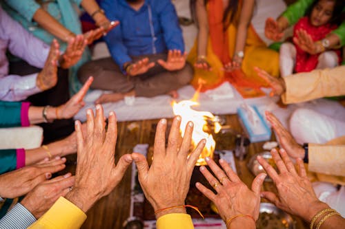 People Gathering Around a Fire