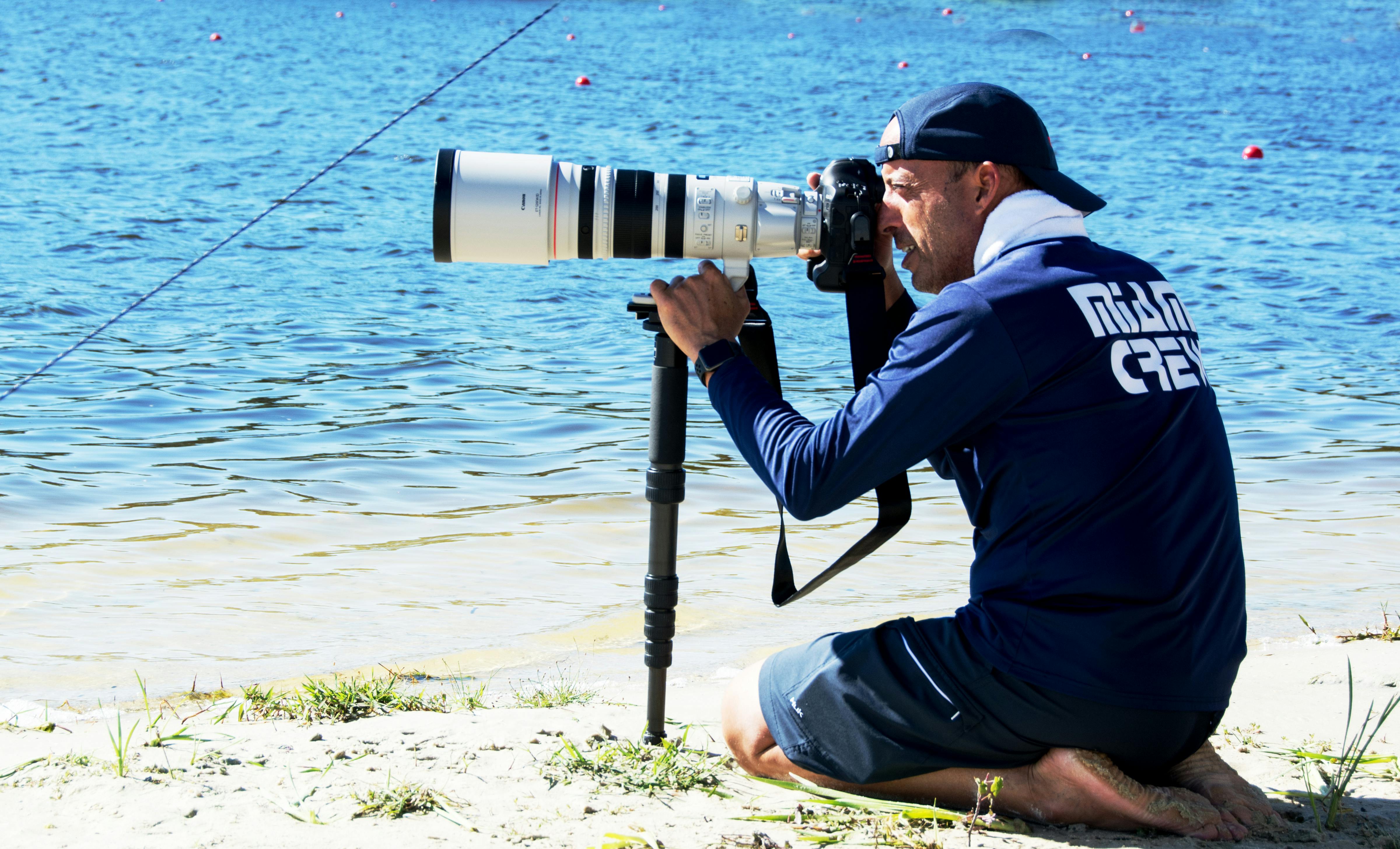 Free stock photo of Sports Photographer at work