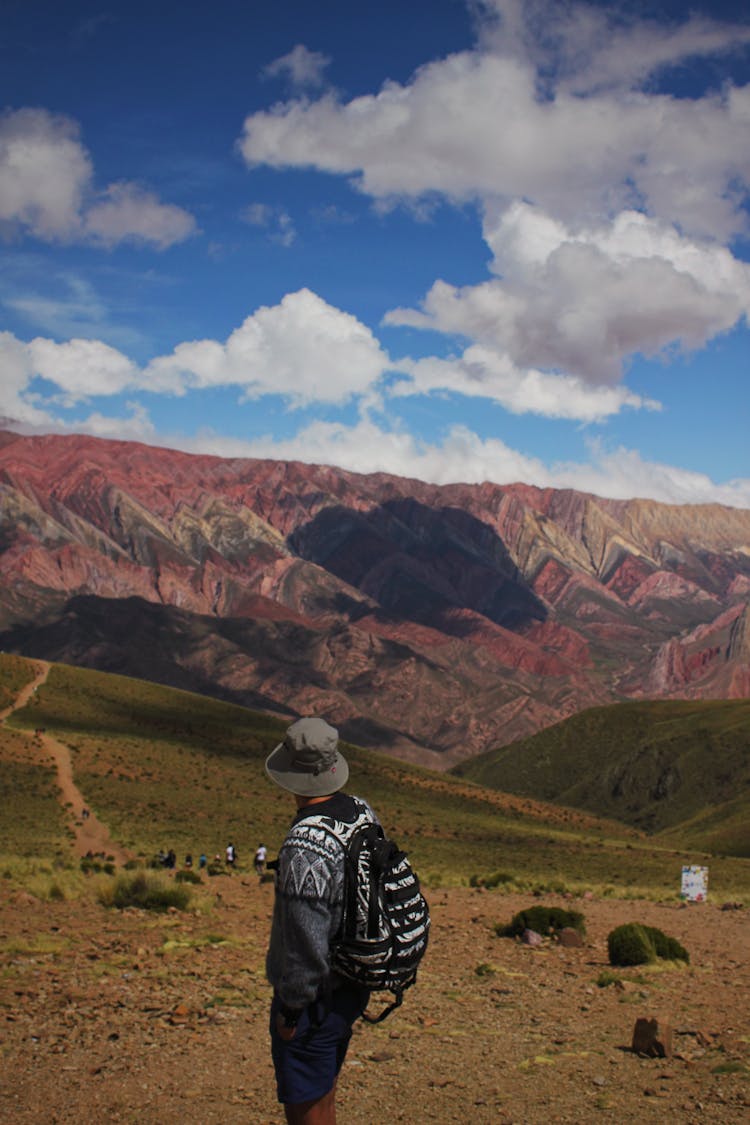 Backpacker In Mountains