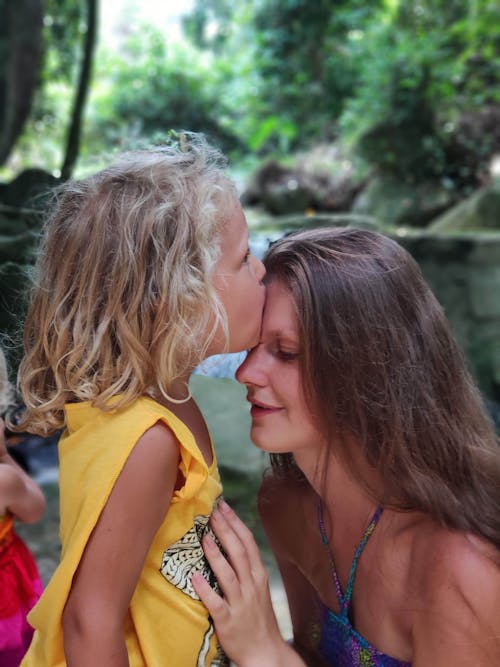 Free Son Kissing His Mother's Forehead Stock Photo