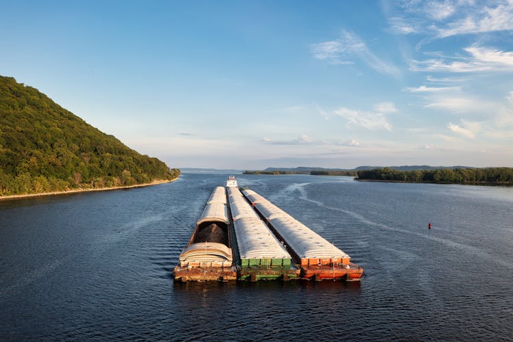 Aerial Photography Of A Barge On The Ocean Under The Sky