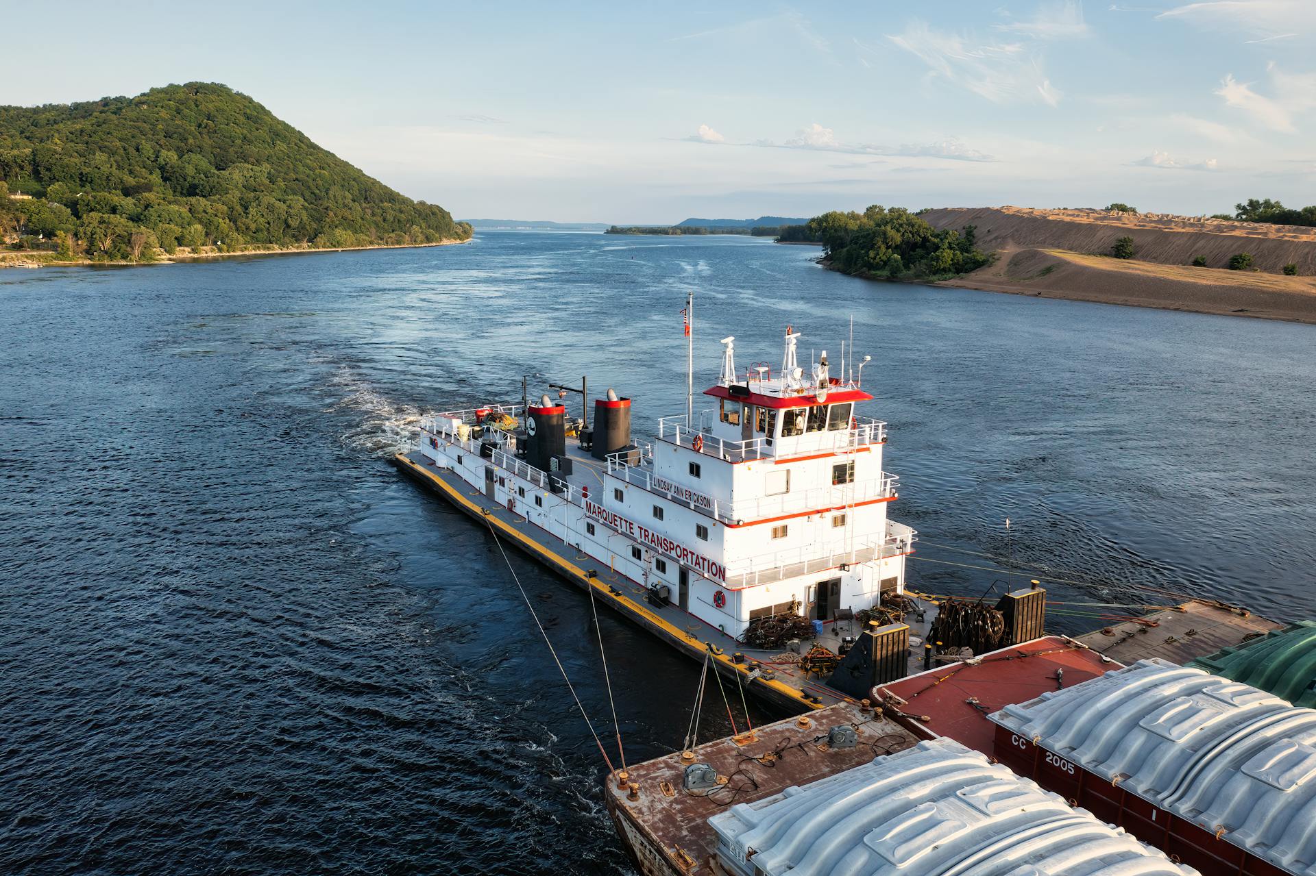 Aerial view of barge transporting cargo along the Mississippi River at Reads Landing, Minnesota.
