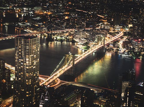 Free Aerial Photography of High Rise Buildings at Night Time Stock Photo