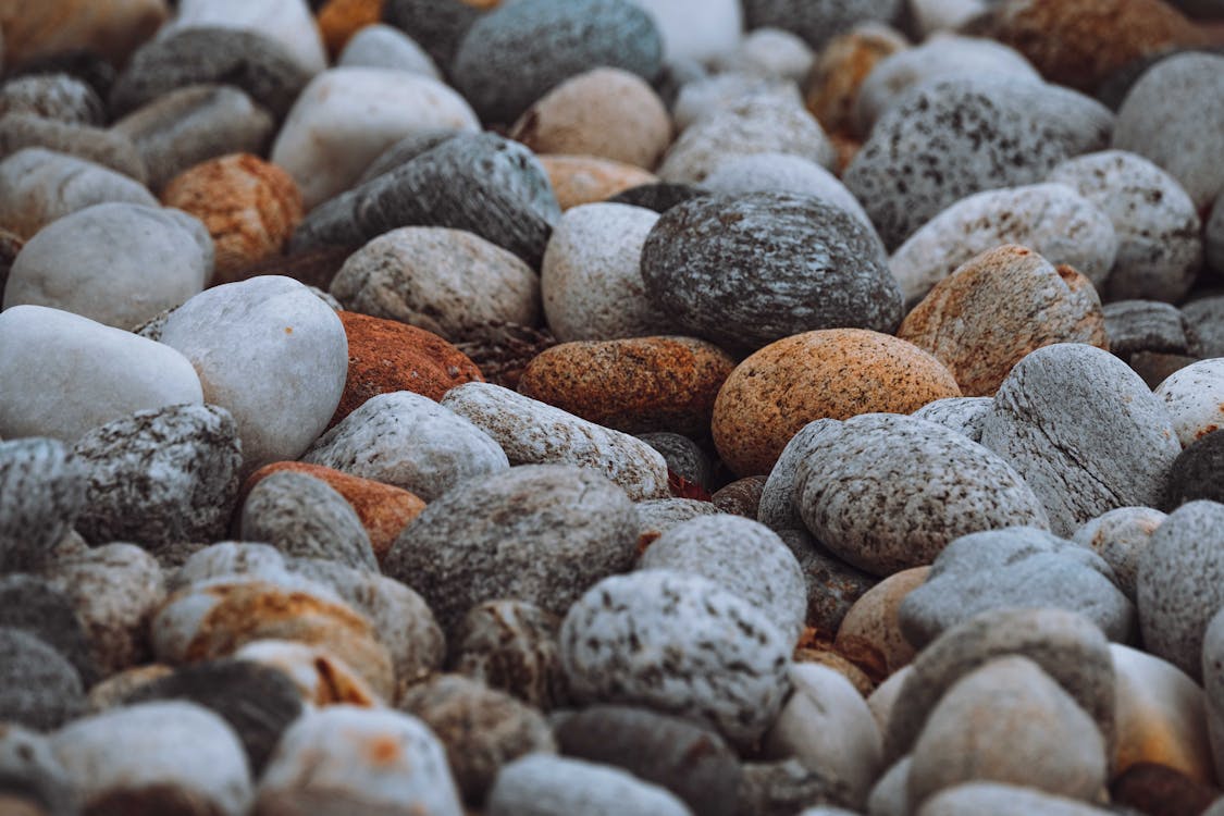 Close-Up Photo of a Texture of Rocks and Stones