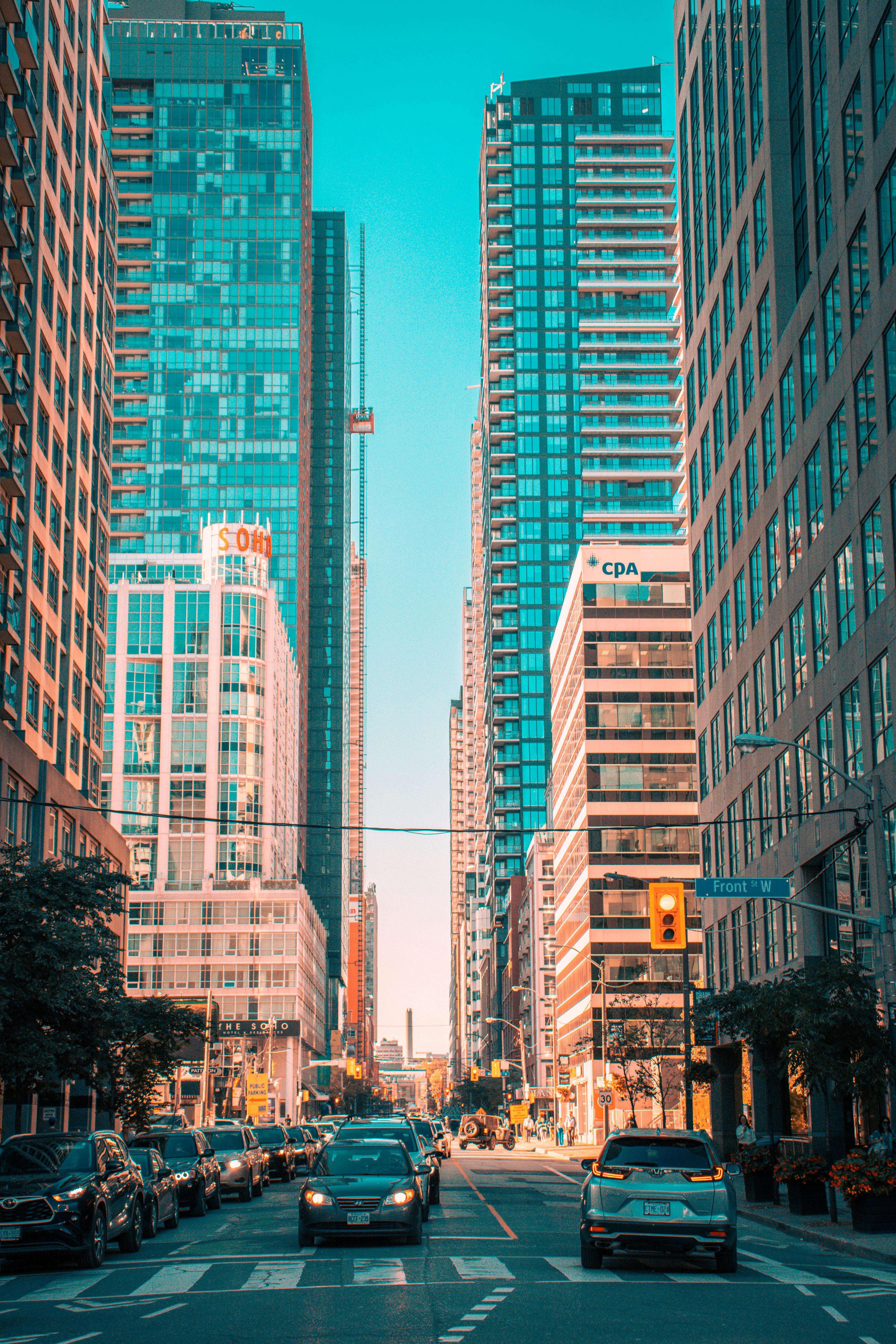 Cars on City Street near High Rise Buildings · Free Stock Photo