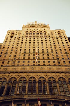Stunning low-angle view of the iconic Fairmont Royal York Hotel facade in Toronto.