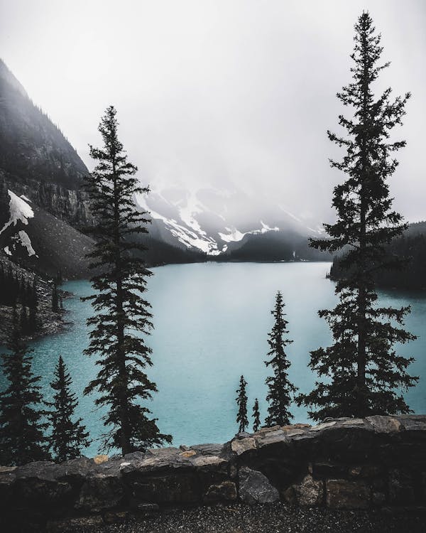 Lake Surrounded by Mountain Taken