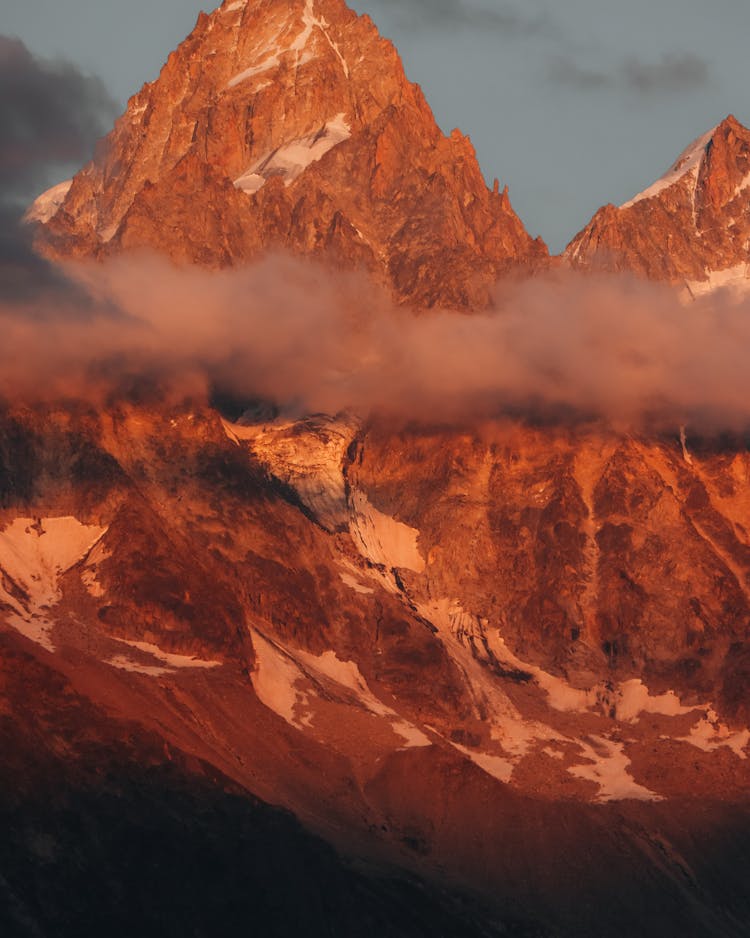 Rocky Mountains Reaching Above The Clouds 