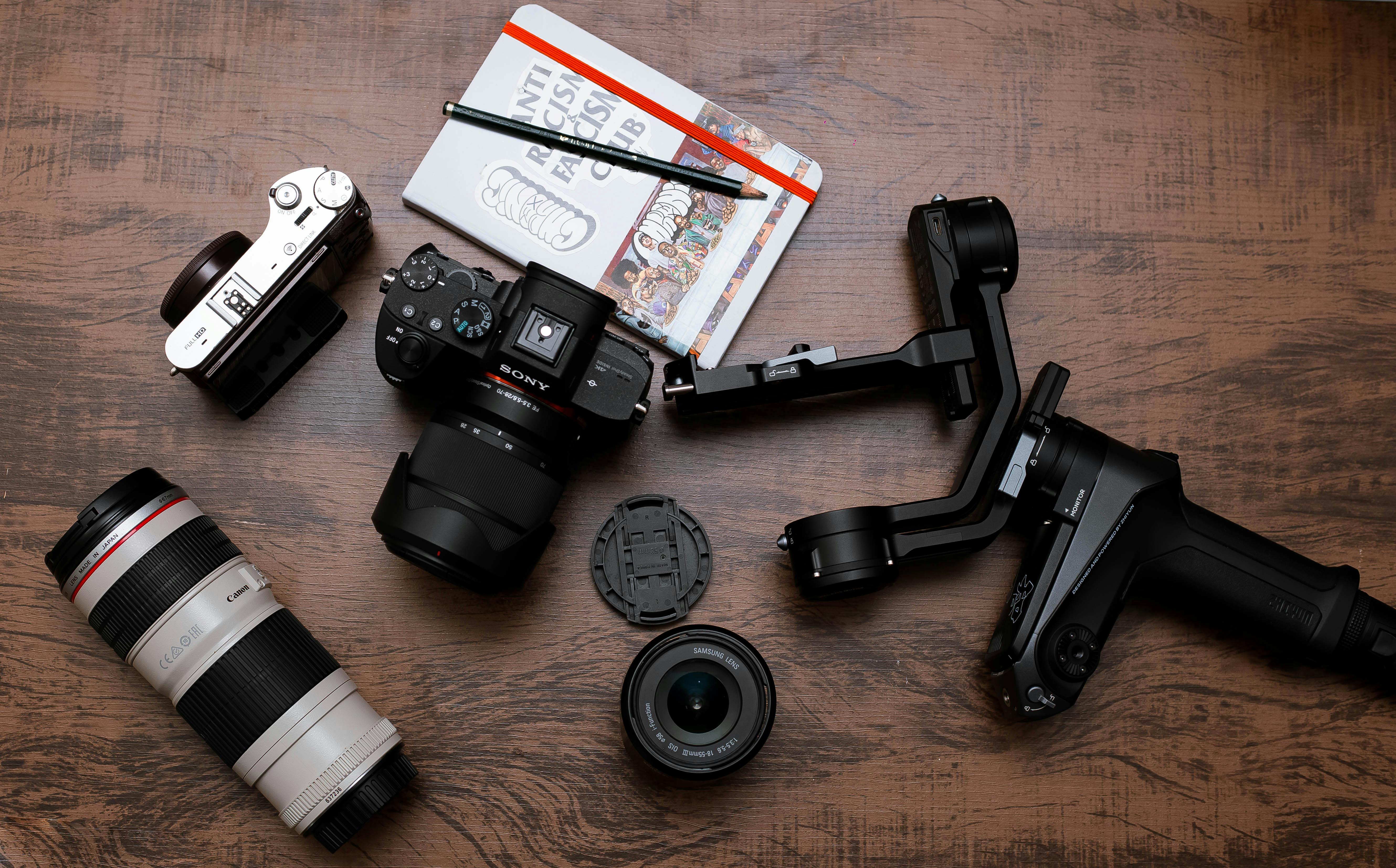 Camera with Photographer Equipment · Free Stock Photo