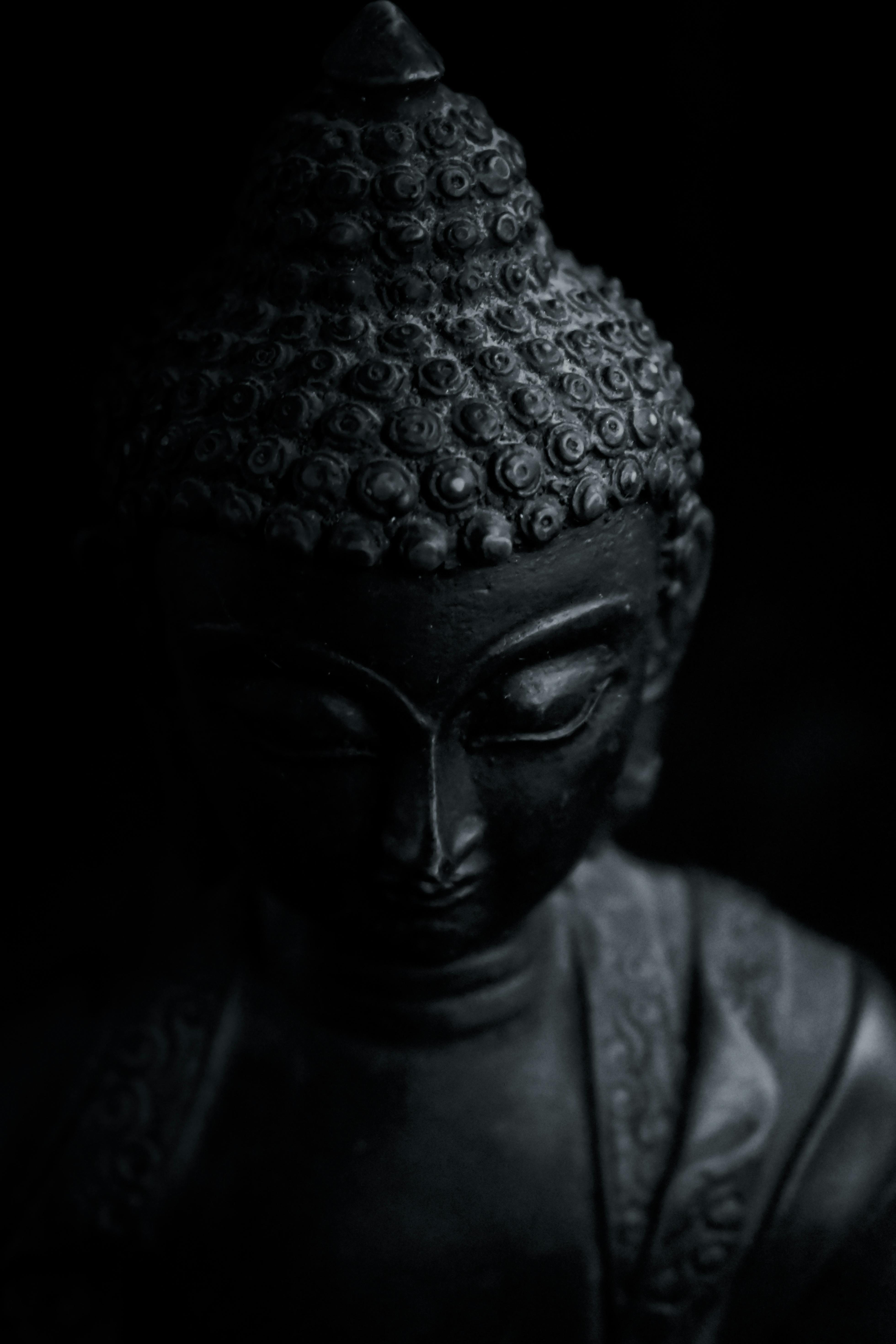Grayscale Photo of a Buddha Statue · Free Stock Photo