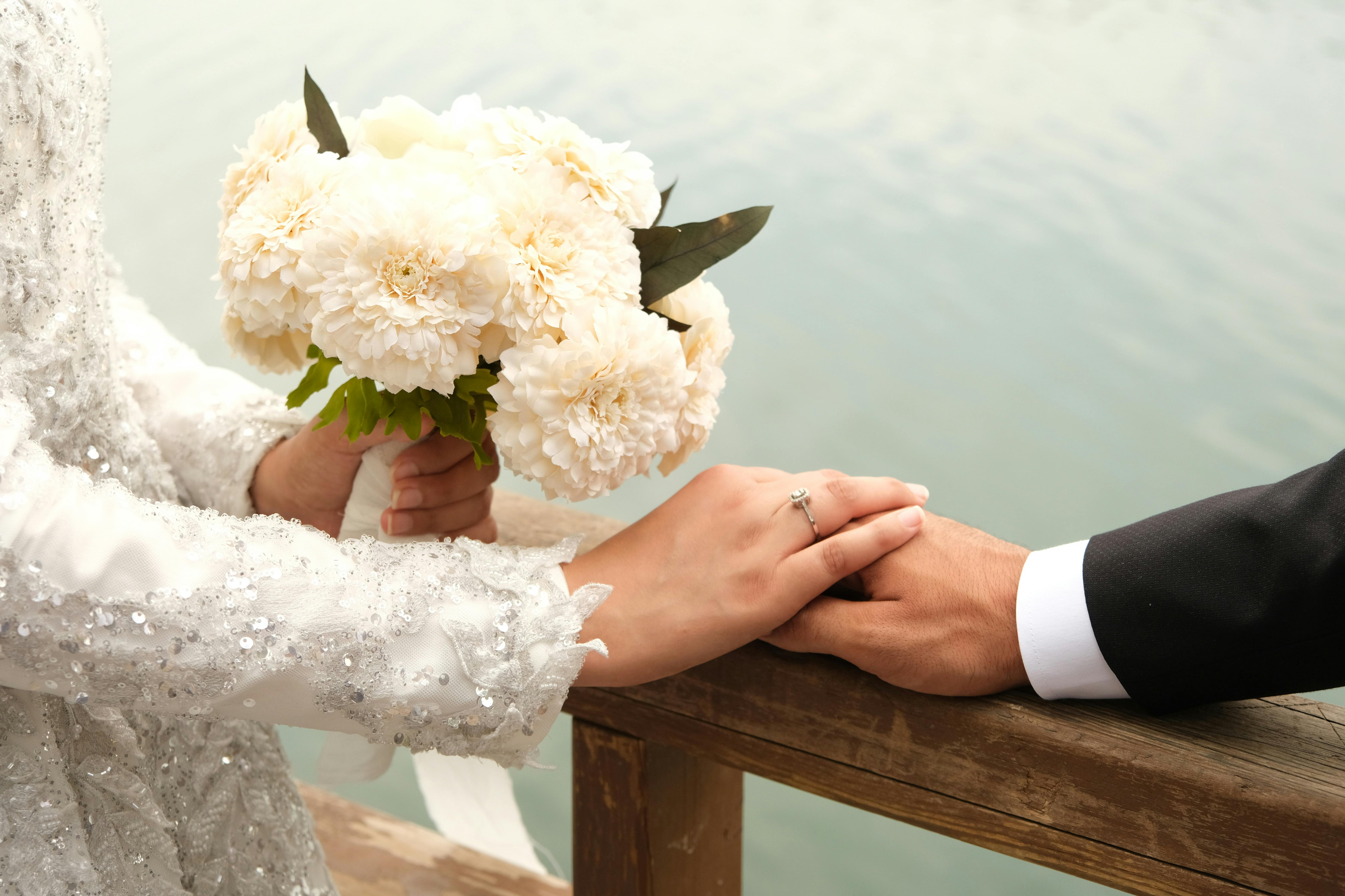 Newlywed Couple Holding Hands · Free Stock Photo