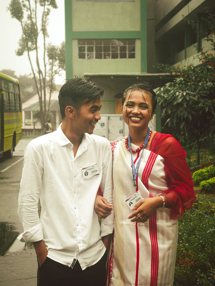 Smiling Couple Standing On A City Street