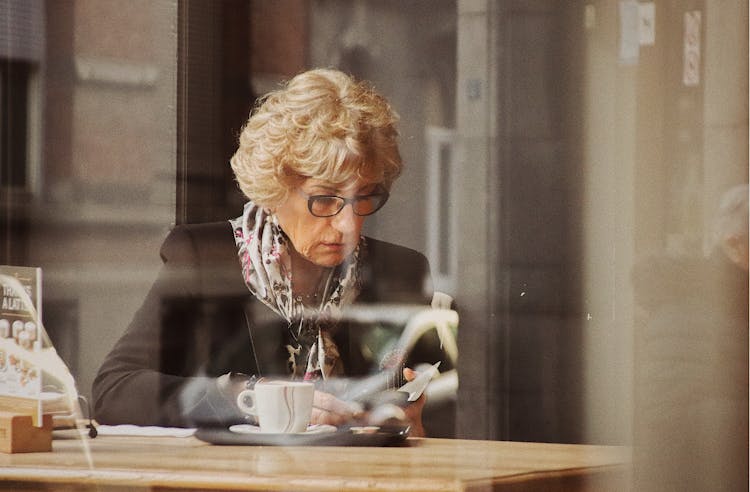 Woman Inside The Coffee Shop