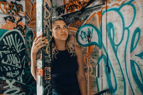 Woman Wearing Black Crew-neck Sleeveless Shirt