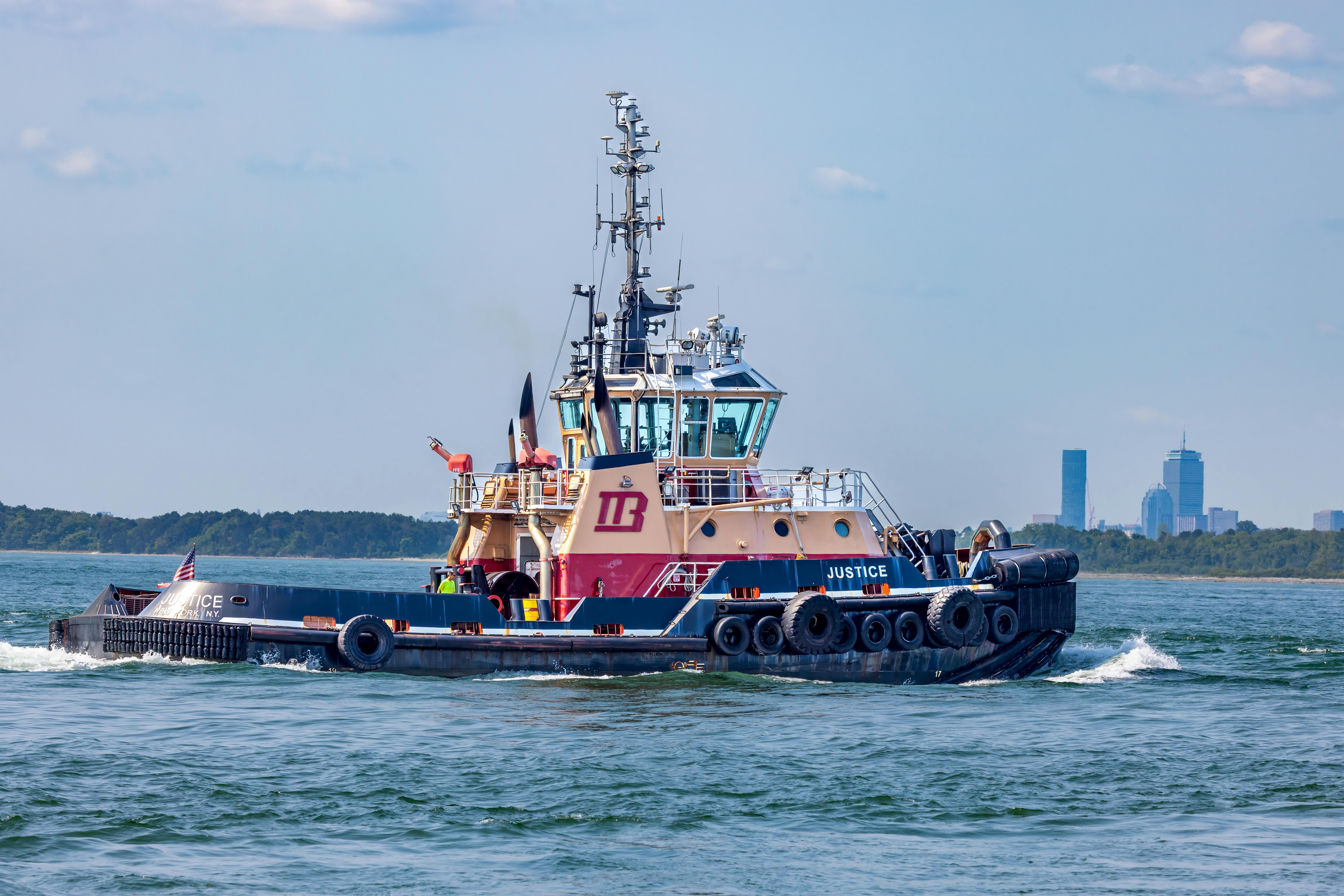 tugboat justice sailing on the bay