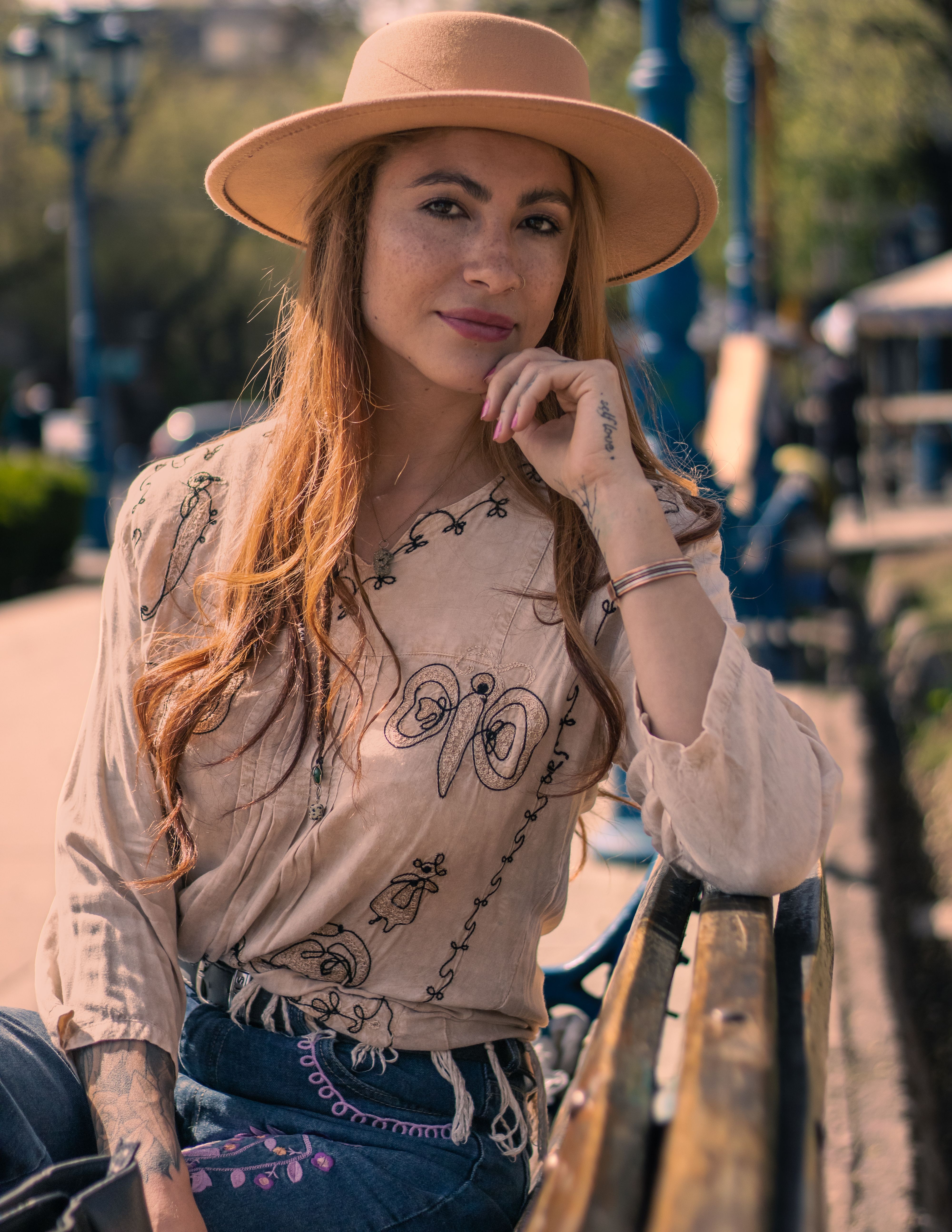 Woman Wearing a Brown Hat · Free Stock Photo