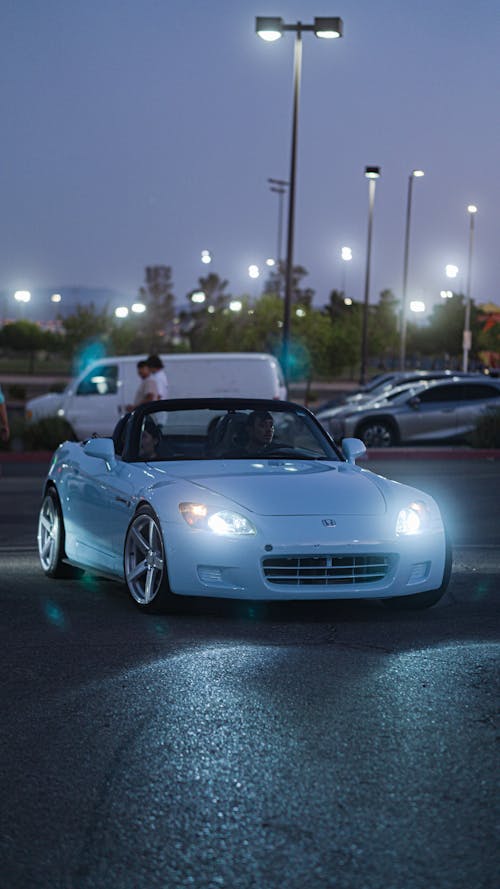 Free White Car on Road Stock Photo