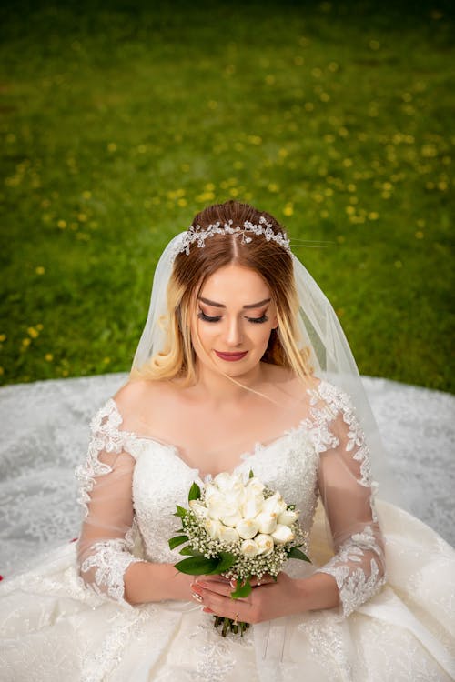 Free Beautiful Bride Holding the Bouquet  Stock Photo