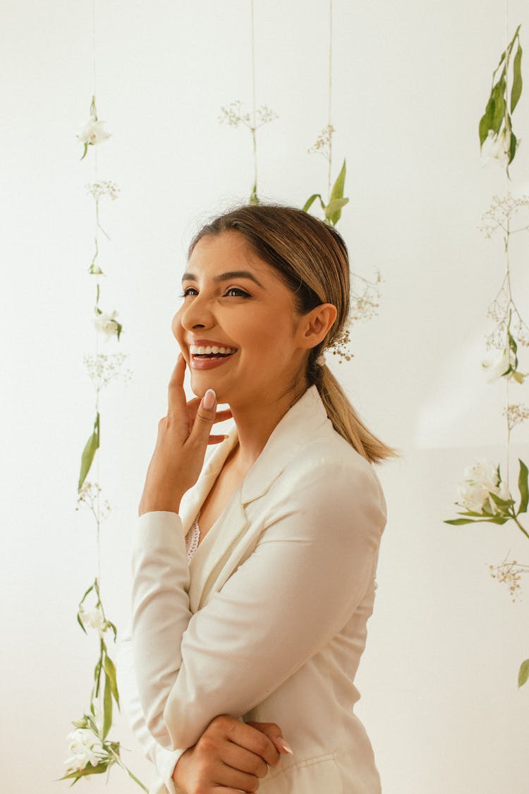 Woman In White Blazer Smiling