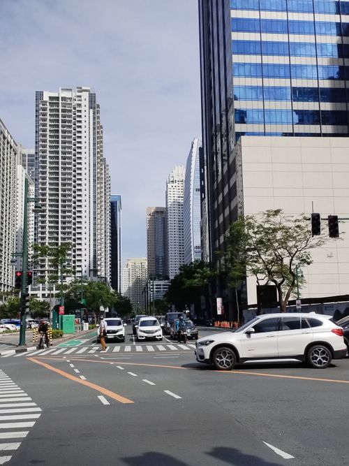 Free A bustling cityscape view featuring skyscrapers and traffic in Taguig, Philippines. Stock Photo