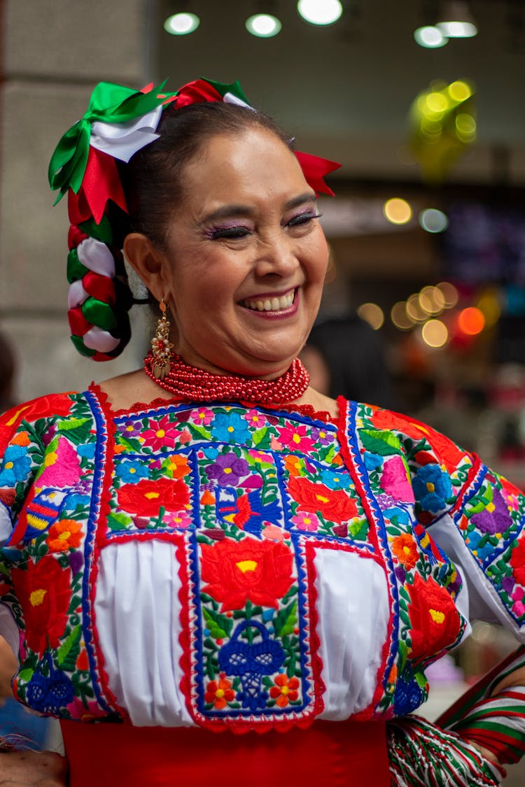 A Happy Woman In Colorful Dress Looking Afar