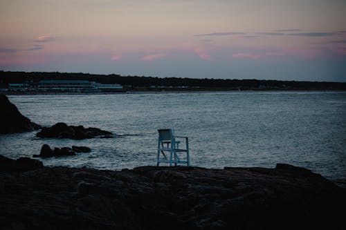 A White Lifeguard Chair on Shore 