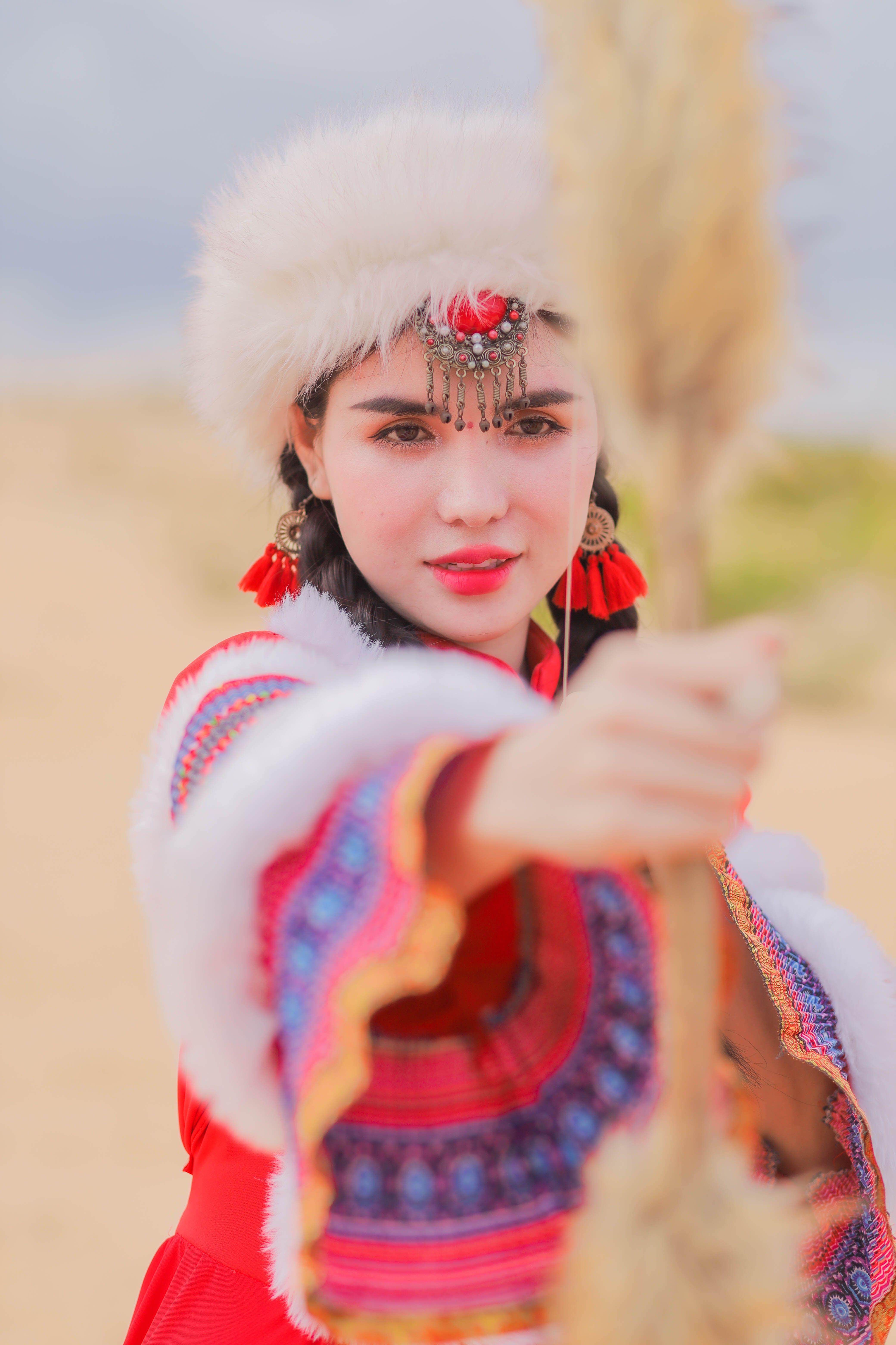 Portrait of a Woman Wearing Traditional Clothing · Free Stock Photo