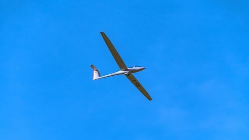 Foto stok gratis bidikan sudut sempit, langit cerah, pesawat peluncur