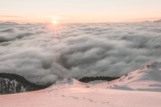 Sea of Clouds Beside Mountain with the Quote "The man who moved the mountain was the one who began carrying away the smallest stones." written on it and have average color value #B8A9A2